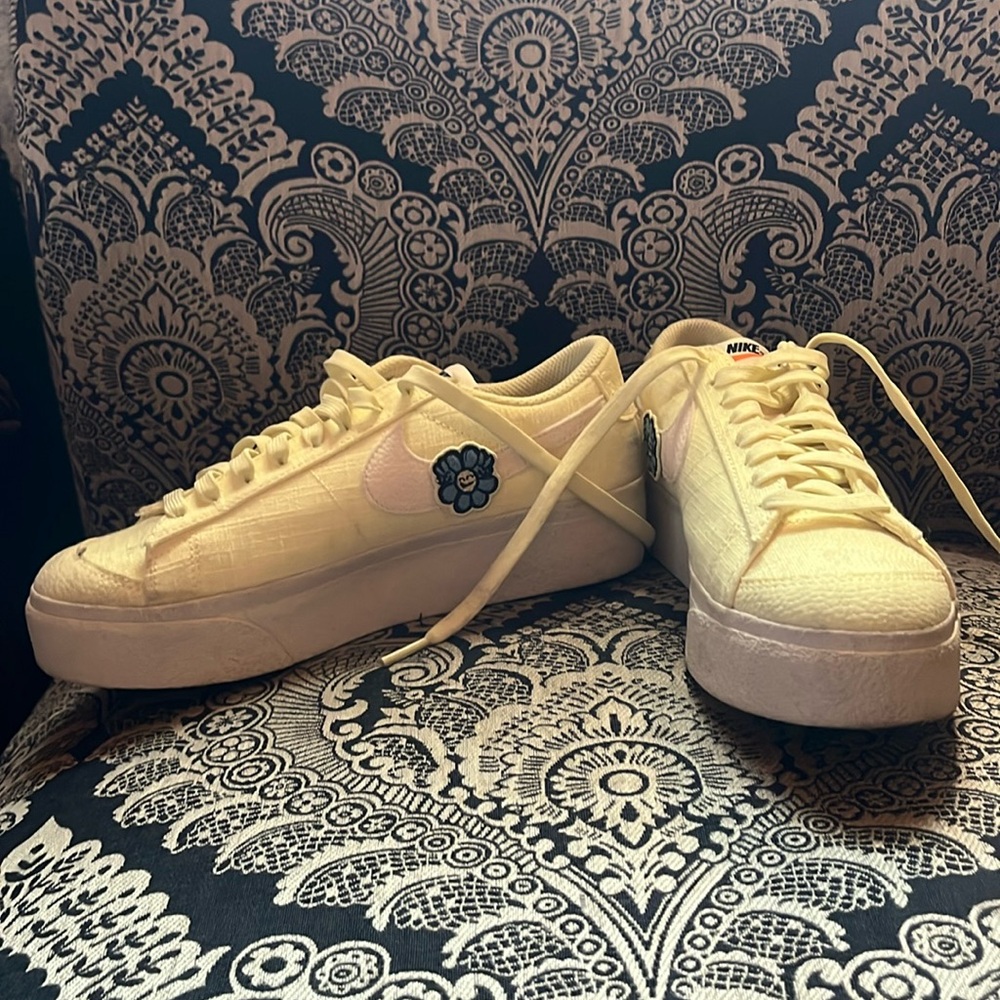 Yellow Nike shoes